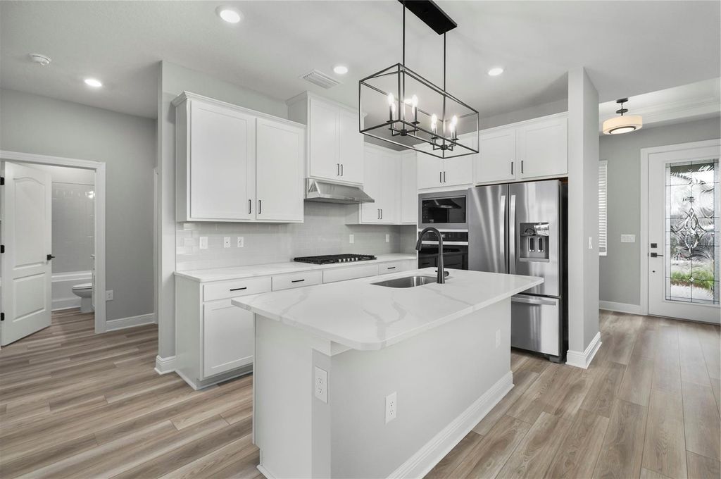 Photo of 1305 Reunion Village Boulevard, Kissimmee, FL 34747 (MLS # TB8428625)