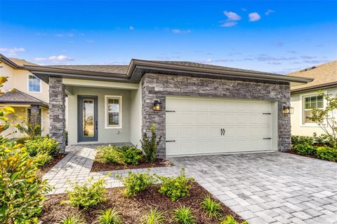 Photo of 1305 Reunion Village Boulevard, Kissimmee, FL 34747 (MLS # TB8428625)
