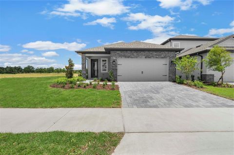 Photo of 1305 Reunion Village Boulevard, Kissimmee, FL 34747 (MLS # TB8428625)
