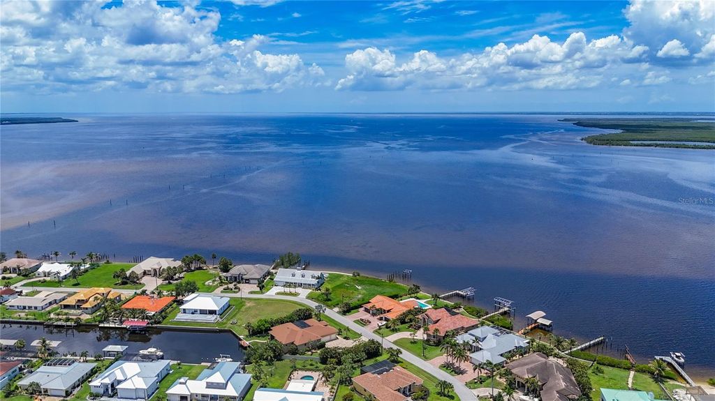 Photo of 119 Creek Drive SE, Port Charlotte, FL 33952 (MLS # C7511645)