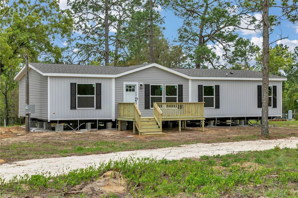 Photo of 1191 NE 124th Terrace, Williston, FL 32696 (MLS # OM722575)