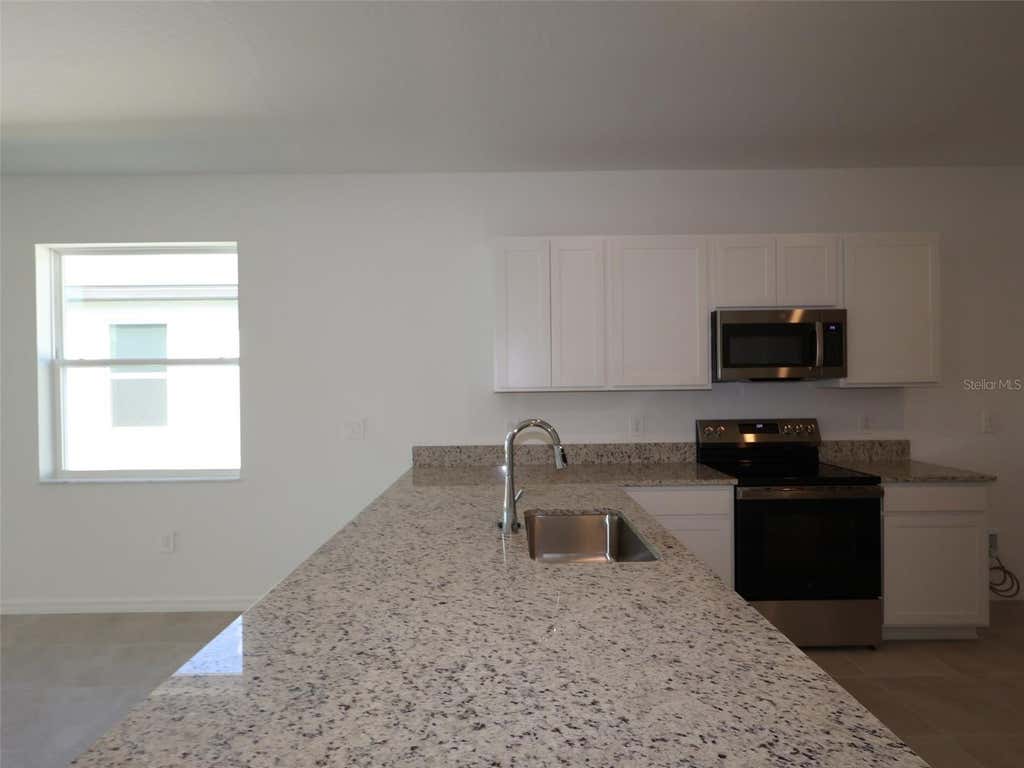 Photo of 9121 Optimist Way, Palmetto, FL 34221 (MLS # R4910702)