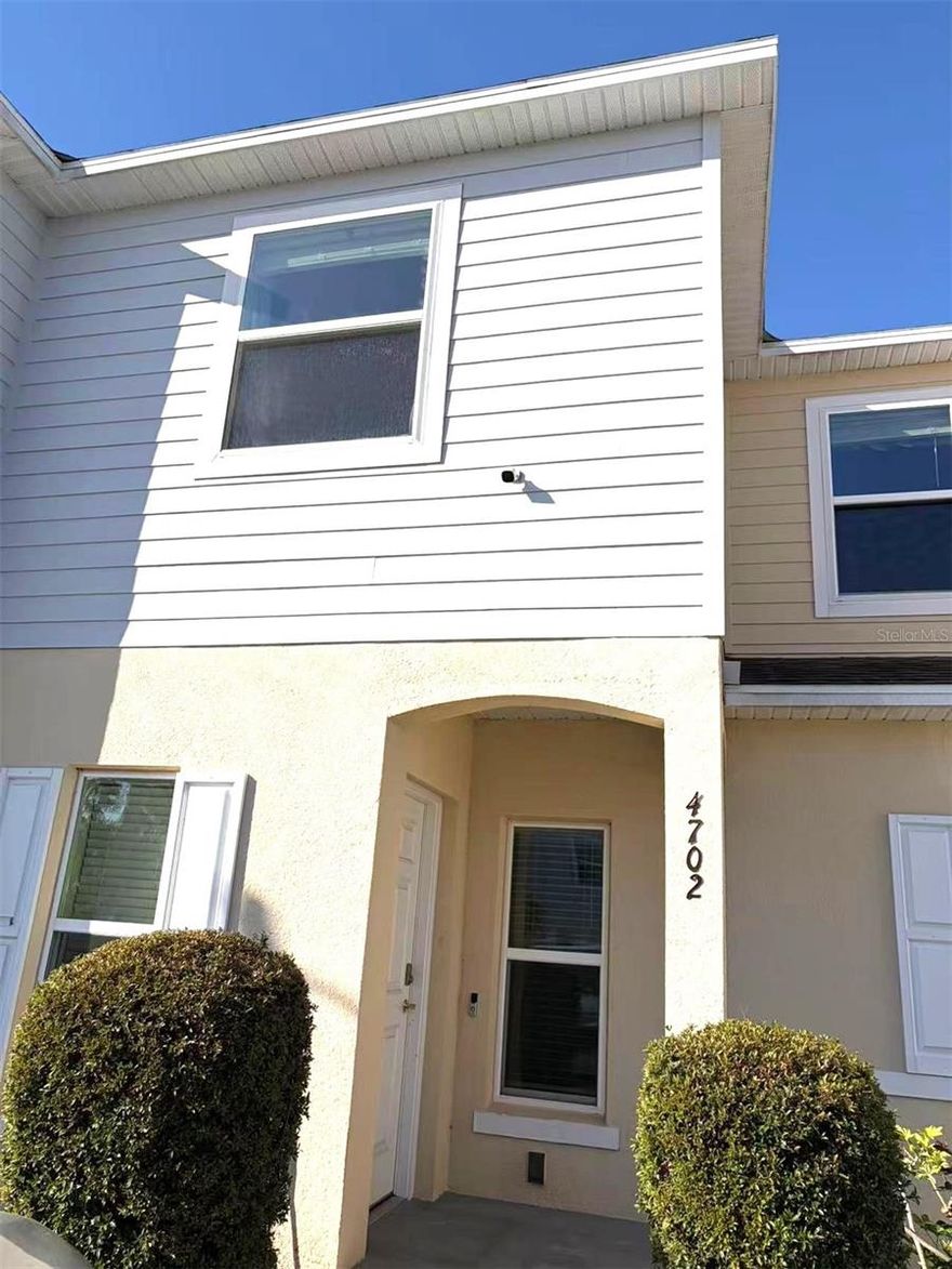 Location, privacy, and spectacular views! This townhouse is located in a gated community, offering maximum security and tranquility. With a modern and functional layout, the property features 3 spacious bedrooms and 2.5 bathrooms, boasting abundant natural light thanks to its prime location. The heart of this home is its connection to the outdoors: relax on your private patio with serene lake views, the perfect retreat after a busy day. The community offers resort-style amenities that elevate the lifestyle of its residents, including two sparkling swimming pools and a professional tennis court. Strategically located just minutes from world-class theme parks, luxury shopping centers, and a vibrant culinary scene.  this home offers the perfect blend of the excitement of Orlando and the peace of a private sanctuary. Schedule your visit today!