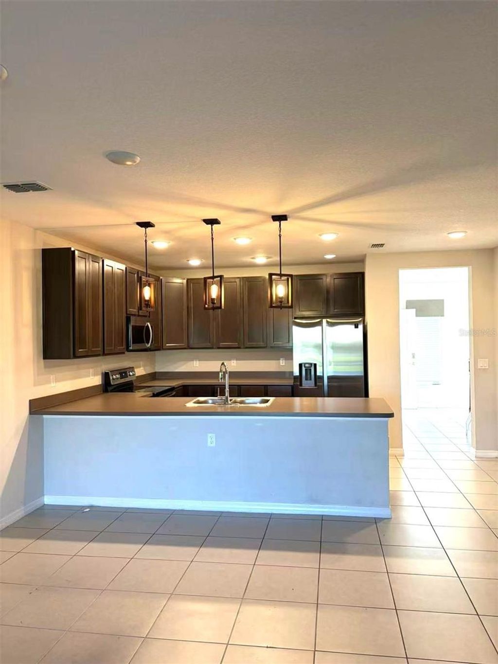 Photo of 4702 Coral Castle Drive, Kissimmee, FL 34746 (MLS # O6393098)