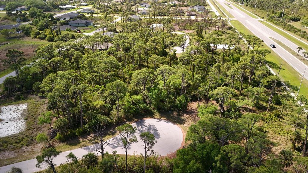 Photo of 107 Hawk Drive, Rotonda West, FL 33947 (MLS # D6146835)