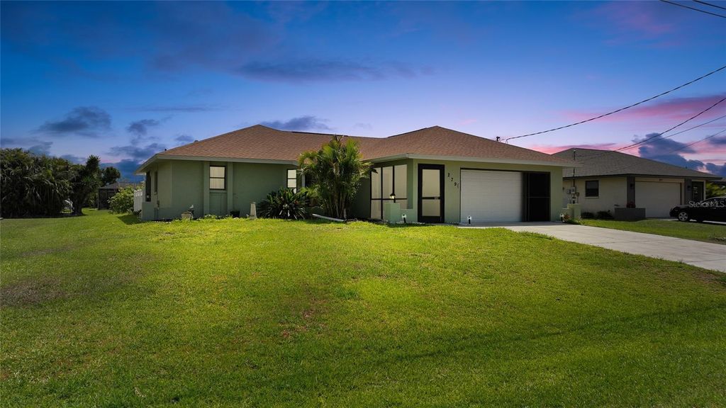 Photo of 279 Mark Twain Lane, Rotonda West, FL 33947 (MLS # D6142410)