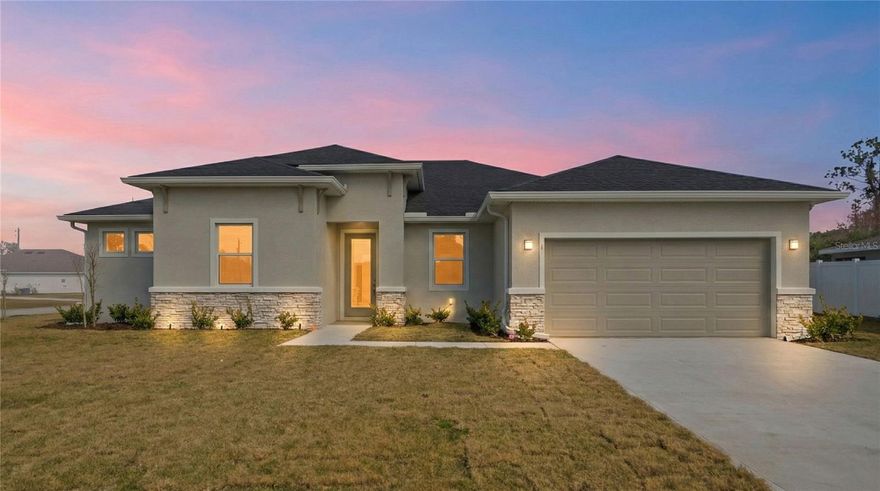 Brand new, fully completed, and energy efficient by Brite Homes, this residence showcases clean, modern design and solid concrete block construction, delivering a durable and low-maintenance living experience. Move-in ready and thoughtfully finished, it offers the advantage of new construction without the wait. The exterior presents strong curb appeal with crisp architectural lines, a stone-accented front elevation, full gutter system, irrigation, and an upgraded modern front door that makes a striking first impression.

Inside, the Brite Dream floor plan features an award-winning layout with tile flooring throughout and no carpet, creating a bright, open main living area ideal for everyday living and entertaining. The kitchen is thoughtfully appointed with quartz countertops, upgraded appliances, and 42-inch soft-close cabinetry, blending modern style with practical functionality. A flexible bonus space provides versatility for a home office, media room, or additional living area, while a private guest suite with its own full bath offers comfort and privacy for visitors or multigenerational living.

The primary suite serves as a relaxing retreat with tray ceilings, 9-foot-4-inch ceiling heights, and a spacious walk-in closet. Living space extends outdoors to the covered lanai, complemented by energy-efficient construction throughout. 

Located in the highly desirable Lehigh Woods R Section of Palm Coast, this central location offers the rare benefit of no HOA or CDD fees, along with convenient access to schools, parks, and everyday amenities. Enjoy easy drives to St. Augustine and Jacksonville, with Palm Coast’s beaches just minutes away, offering modern new construction without added community costs.

All information pertaining to the property is deemed reliable, but not guaranteed. Information to be verified by the Buyer. Be advised that cameras may exist recording audio and video inside/outside the property, such as ring doorbells. Photos are digitally enhanced and could be altered, please verify.