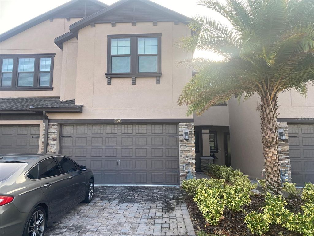 Photo of 4668 Almada Lane, Wesley Chapel, FL 33543 (MLS # TB8320637)