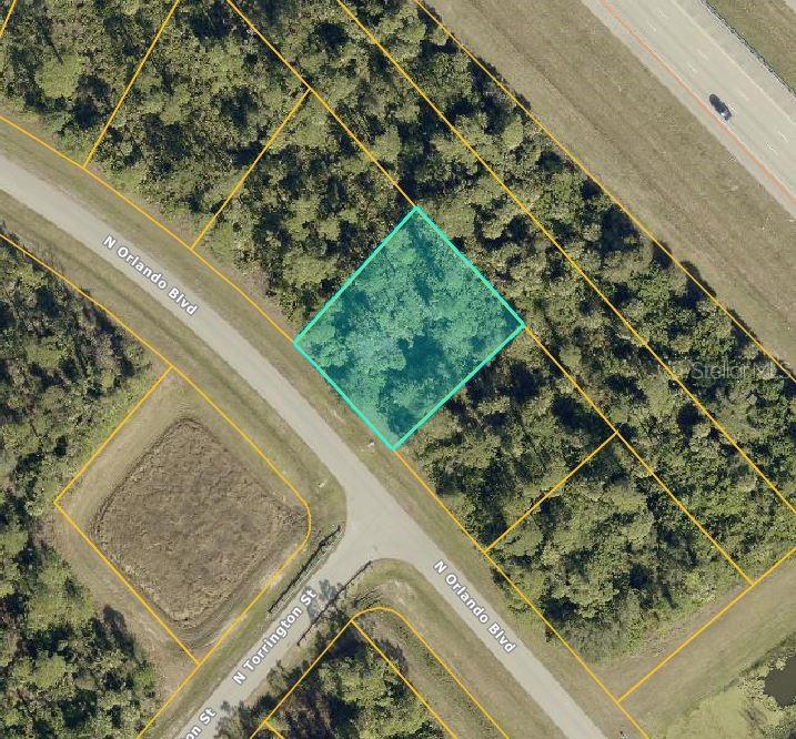 Oversized residential lot with rare AC-10 (Activity Center 10) zoning in desirable North Port location! This unique zoning allows for flexible development options, including residential, mixed-use, and limited commercial possibilities—making it an excellent opportunity for builders, investors, or future homeowners.
Enjoy the perfect blend of peace and convenience—located just minutes from I-75, yet surrounded by natural beauty that gives the area a quiet, country feel. The generous lot size offers ample space for a custom home, outbuildings, or potential future expansion.
Situated in one of Southwest Florida’s fastest-growing cities, this lot provides easy access to world-class boating, fishing, golf courses, nature trails, shopping, and the Atlanta Braves Spring Training complex. North Port is a thriving, active community with a bright future—and this property sits at the heart of it all.
Whether you're ready to build or want to secure land in a strategic growth corridor, this parcel offers zoning flexibility, location advantages, and strong long-term value.
Buyer to verify permitted uses with the City of North Port. Don’t miss this opportunity—drive by today and see the potential!
