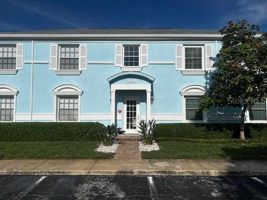 Highly sought after FIRST FLOOR 2 bedroom, 1 bath unit located in the resort style Community at Waterside at Coquina Key. Minutes from downtown St. Petersburg and a short drive to the world renowned Gulf Coast beaches. This unit includes ceramic tile flooring in kitchen, dinning room, living room, and bath. Both bedrooms have wood laminate flooring. This lovely unit has been freshly painted and has ceiling fans in both bedrooms and living room. A large private brick patio on a serene canal, offers the perfect outdoor haven where you can relax, enjoy the coastal breezes and take in the sights of the playful dolphins and manatees, as well as other wild life. Resort includes 2 heated pools, one on Tampa Bay, take in breath taking sunset views. Pickleball, basketball, sand volleyball, shuffleboard and tennis are available for your enjoyment. Residents have the option to lease or purchase, dry docks or wet slips when available, providing seamless access to Tampa Bay. HOA includes 24 Hour Guarded Security gate, cable TV, exterior insurance, pest control, grounds maintenance, pool maintenance, trash, water, recreational facilities, escrow reserves, exterior repairs add exceptional value and peace of mind. Don't miss your chance to own this tropical retreat on the exclusive island of Coquina Key. Waterside is a pet friendly community.