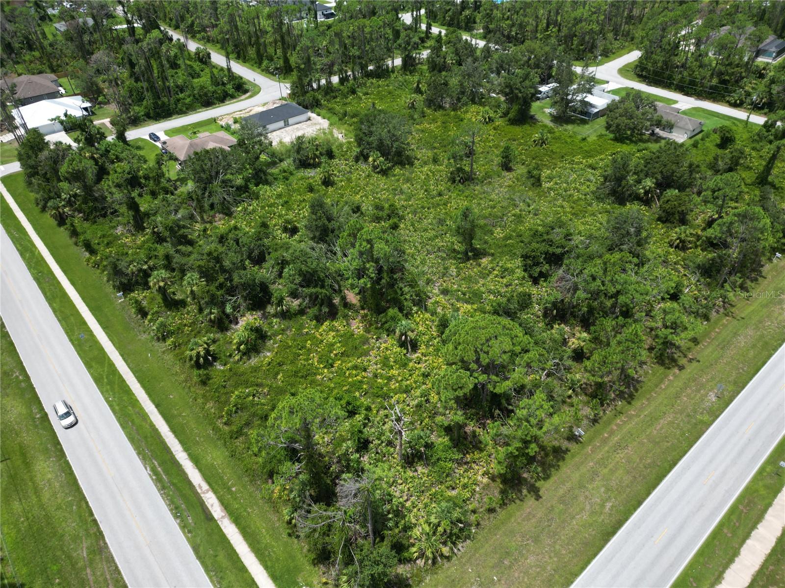 Long awaited SEWER COMING SOON! A 1500 student charter school scheduled to be built across street soon and will place sewer lines easily accessible for this site! BEST OPPORTUNITY IN NORTH PORT!!! PRIME LOCATION!! 3.22 ACRES! NEW, APPROVED HIIGH INTENSITY CORRIDOR ZONING AND SELLER FINANCING! ALLOWS: Commercial/Residential Aptmts, Animal boarding and Daycare/Hospital, Vet, Auto Repair, Bank, Bar/Night Club, B & B, Distillery, Daycare, Earthmoving, Essential Services, Food Truck Park or Mobile, Funeral Home, Hospital, Mini Golf and Driving Range, Laundromat/Dry Cleaning, Medical/Dental, Museums, Office Outdoor storage, Personal Services, Personal Storage, Places of Assembly, Radio/TV Station, Recreation Facilities, Recreation Commercial or Passive, Resort, Restaurant, Retail Sales and Services, Schools, Shooting Range, Social Services, Theatre/Auditorium, Warehouse and Wholesale and more. SPECIAL EXCEPTIONS include: Major Auto Repair, Borrow Pit, Campground, CAR WASH, Dealership Auto Sales and Rental, Heavy Machinery Sales, HeliPad, Hospital, Industrial Light, Laboratories/Testing, Pain Management Clinic, RV Resort, Stadium, Transportation Terminal, and Vehicle Fueling. This prime property is located on the booming East side of N Port and the only one like it available. Super RARE Location and zoning. CALL NOW!!!! City Water, sewer on its way, and southern exposure. Start your business now or hold for future. ACT NOW!!!!!