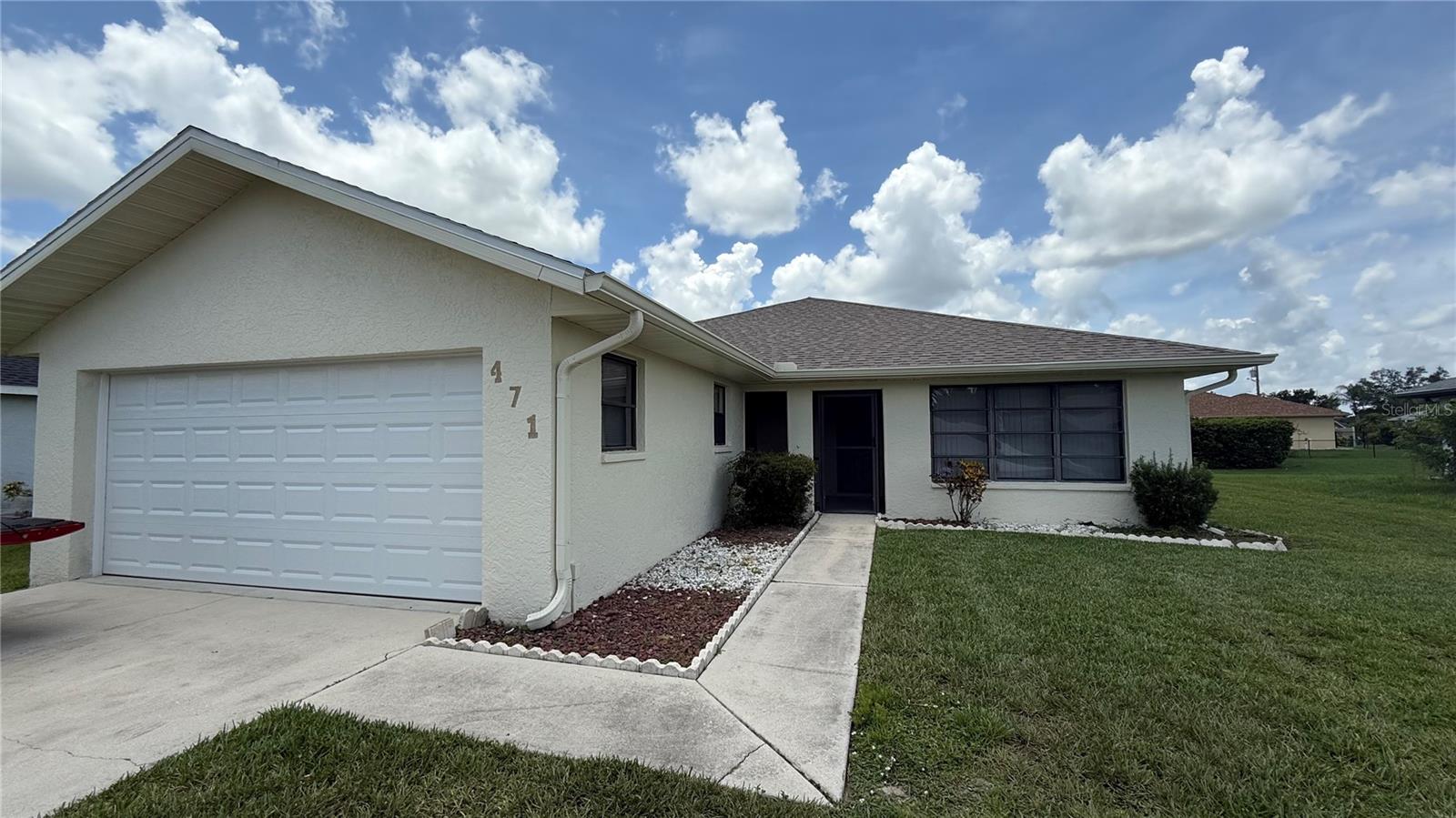 Recently remodeled 3-bedroom, 2-bathroom home located in the desirable Deep Creek neighborhood. This home features beautiful natural looking flooring throughout, creating a warm and inviting atmosphere. The updated kitchen includes new appliances and plenty of cabinet space, perfect for everyday living and entertaining. Enjoy the outdoors year-round from the screened-in lanai with a freshly epoxied floor—ideal for relaxing or hosting guests. The home also includes a spacious layout, modern finishes, and a quiet, well-maintained location in one of Port Charlotte’s most sought-after deed-restricted communities. Conveniently located near shopping, dining, and I-75 for easy commuting. Pets considered with approval. This home is move-in ready—schedule your showing today.