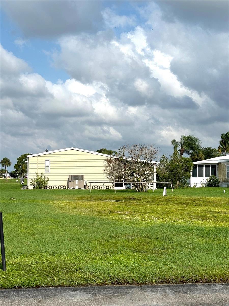 Vacant lot in a vibrant 55+ community! La Casa offers the ultimate Florida lifestyle. We have 974 homes nestled among a variety of native trees with spacious common grounds surrounding our eight lakes. Located between Sarasota and Fort Myers, this is a boater's dream with access to the Gulf of Mexico. It is convenient for shopping, sightseeing, golfing, fishing, and boating, as well as all the culture and elegance the Southwest Florida area is noted for. La Casa may have the best pools in the area. Our crown jewel is an extremely large, 40 X 60-foot swimming pool that is kept at a perfect 87 degrees. Our smaller 20 x 40 pool is quietly nestled between the clubhouse and the Activity Building. Both pools have adjacent hot tubs which are ideal for soaking muscles that are tired from golfing or tennis. Wireless Internet (Wi-Fi) is available at the Clubhouse, Activity Building, and Recreation Hall area where these pools & spas are located, so you can catch some rays while you catch up on your email! Sound enticing? Come for a visit to this self-contained oasis and see for yourself why La Casa is the ultimate destination for both snowbirds and year-round residents!