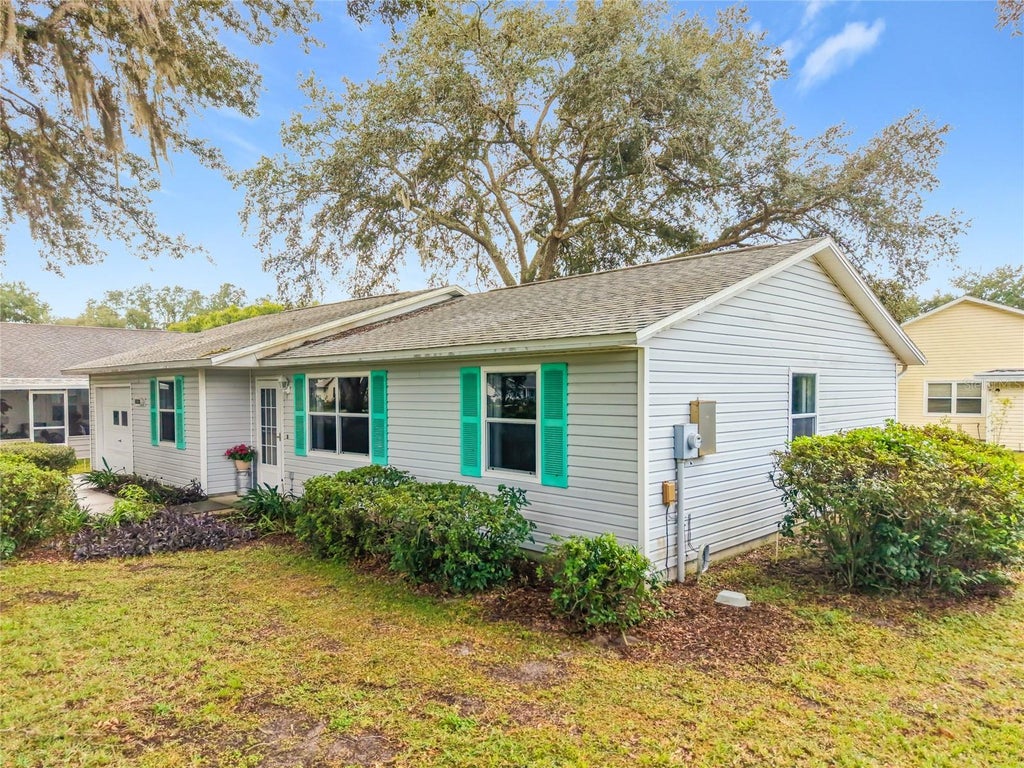 Photo of 1038 Scotch Pine Court, Leesburg, FL 34788 (MLS # O6453391)