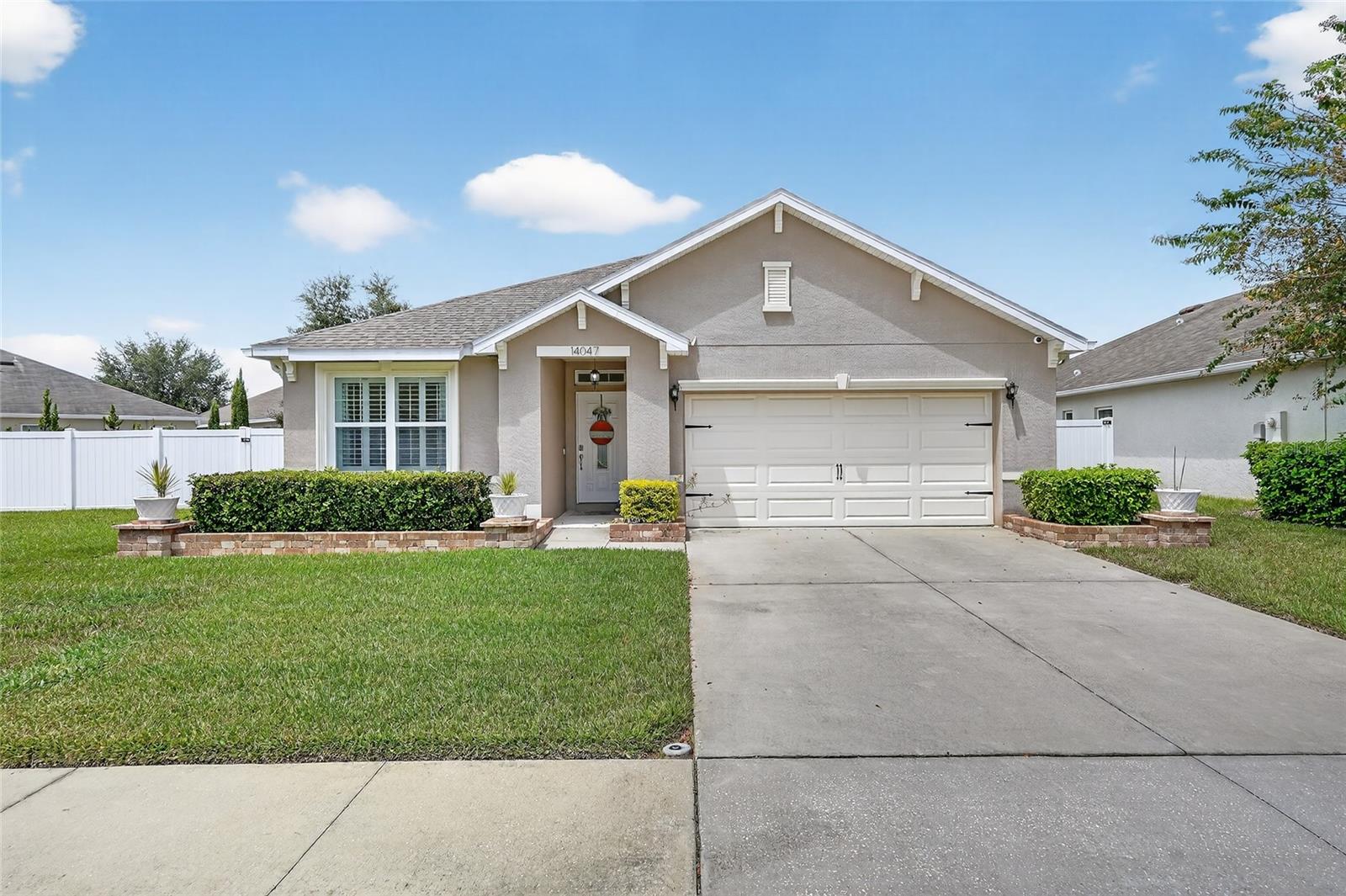 Welcome to this beautifully maintained three-bedroom, two-bathroom pool home in the Villages at Avalon in Spring Hill, offering the perfect blend of style, comfort, and modern upgrades. Situated on a spacious corner lot with a pond view, this home boasts a 2023 roof, tier 1 Trane HVAC system (2021) with a 10-year warranty, and a SMART home system for peace of mind and convenience. The outdoor space is a true highlight, featuring a 2021 pool, fence, pavers, and a charming pergola, perfect for enjoying Florida evenings. Step inside to find elegant details throughout, including crown molding, upgraded baseboards, bamboo floors (2021), and plantation shutters. The open floor plan includes a bright living room with a cozy fireplace, a dining room, and an open kitchen with stainless steel appliances, granite countertops, a breakfast bar, and a walk-in pantry. Large windows and sliding glass doors flood the home with natural light and open to the screened-in lanai, where you can relax, grill, or lounge by the sparkling pool year-round. The split-bedroom layout offers privacy, with a spacious primary suite featuring a large custom walk-in closet, an updated spa-like bathroom with a large shower and bench, dual sinks, new vanity, mirror, and fixtures. Two additional bedrooms share a full bathroom, while the laundry room includes cabinets for added storage. Ceiling fans throughout the home provide comfort in every room. The community also offers its own clubhouse and pool, adding even more ways to enjoy your Florida lifestyle. Conveniently located just outside a Publix shopping center and minutes from the Suncoast Parkway, this home offers easy access to dining, shopping, and travel. This super clean, well-maintained property is move-in ready and waiting for its next owner to enjoy all it has to offer. Schedule your showing today!