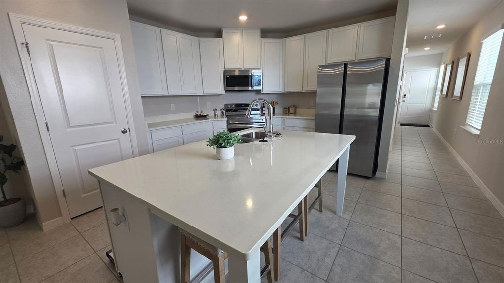 Photo of 5575 Maddie Drive, Haines City, FL 33845 (MLS # O6201105)