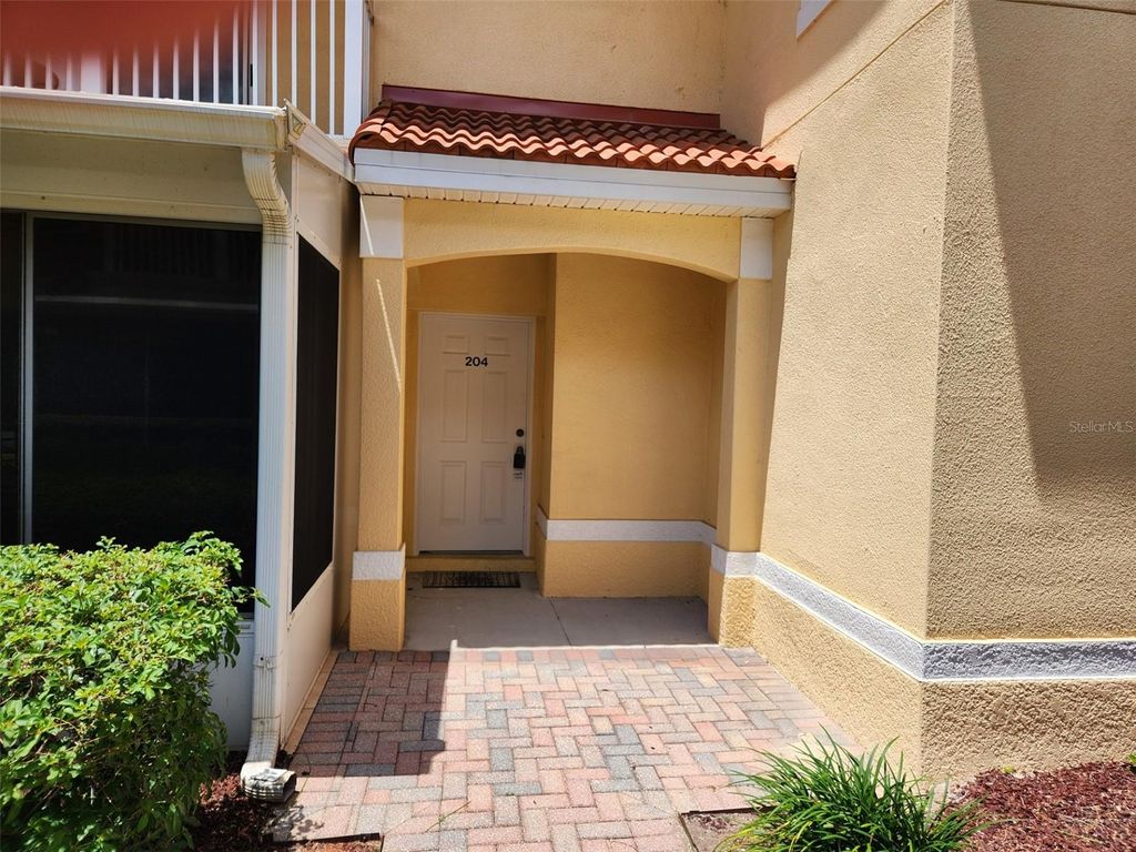 Photo of 21008 Sunpoint Way #204, Lutz, FL 33558 (MLS # W7875155)