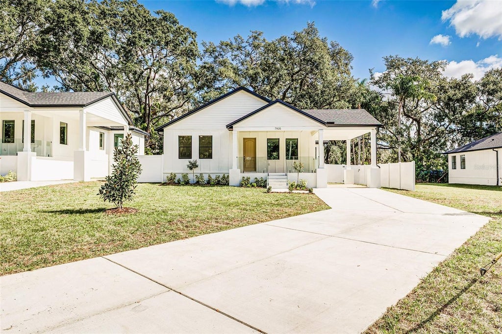 Photo of 7905 N Greenwood Avenue, Tampa, FL 33604 (MLS # O6443520)