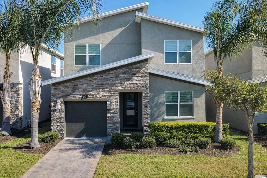 Photo of 651 Drop Shot Drive, Davenport, FL 33896 (MLS # G5104948)
