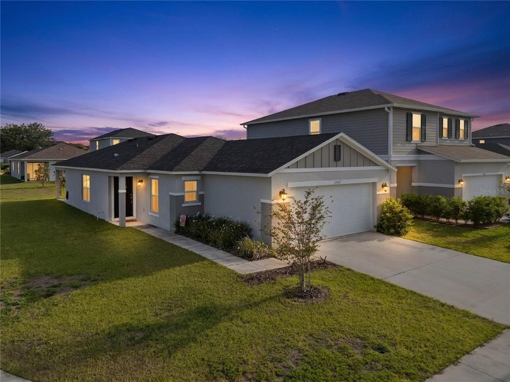 Photo of 1247 Papaya Circle, Davenport, FL 33897 (MLS # O6403216)