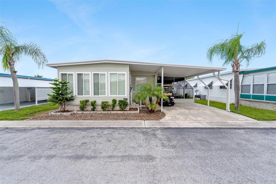 Don’t miss out on this Lovely 2 Bedroom/2 Bathroom Mobile Home Nestled in the heart of Vibrant Pinellas Park, Florida.  This charming enclave beckons those seeking an affordable, close-knit 55+ community where sunny days and a laid-back lifestyle are the order of the day.  As you approach the home, you'll be greeted by a well-maintained carport that provides shelter for your vehicle from the elements. Upon entering the home, you'll be welcomed into the spacious sunroom and living room bathed in natural light from large windows that frame the serene surroundings. The open floor plan seamlessly connects the sunroom, living room to the kitchen, creating a warm and inviting space for gatherings and meals.  The kitchen boasts modern appliances, ample counter space, and plenty of cabinets, making it a chef's delight. It's perfect for whipping up your favorite recipes and offers easy access to the dining area for serving convenience.  The primary bedroom is a peaceful retreat with its own private bathroom, complete with a shower and a vanity.  It also has a large walk in closet with built in cabinetry.  The second bedroom is spacious and versatile, suitable for guests, a home office, or a hobby room with another large walk in closet. A second full bathroom with a shower and storage ensures convenience for all.  The Laundry Room is off the second bedroom with a full size washer and dryer. Step onto the inviting sunroom, a perfect spot for sipping morning coffee or enjoying evening sunsets with friends and family.  Golf Cart is optional with purchase of the home.  Also, Home may be sold Furnished or Unfurnished.  Water Heater 2017, AC around 8 years old & flat roof 2017.  You'll enjoy easy access to nearby Beaches, parks, shopping centers, and dining options. Plus, it's just a short drive to major commuter routes, making your daily commute a breeze.