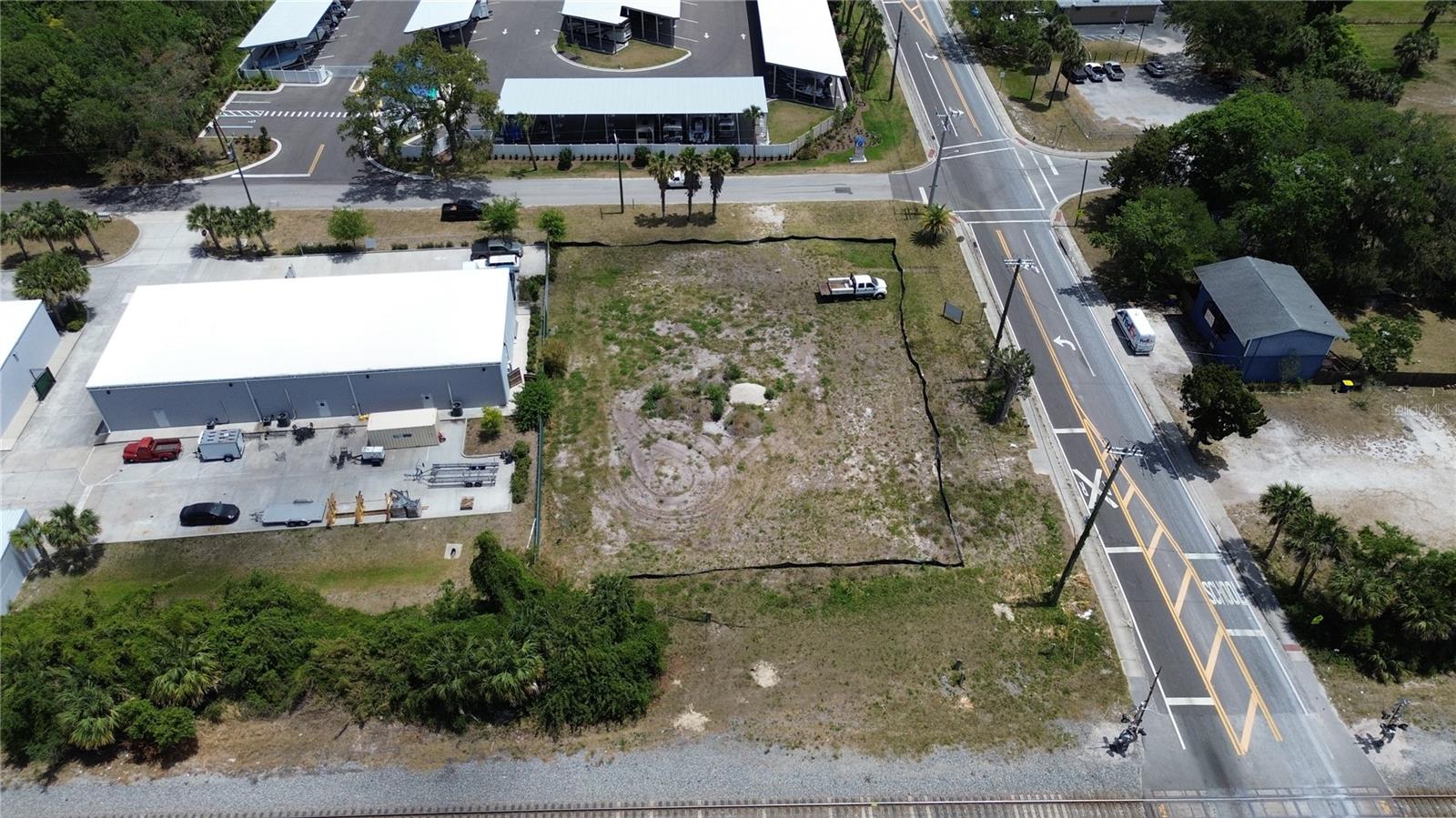 .7 Acre lot with City approved plans for 6,000 SF warehouse in Edgewater, FL. Desirable & booming industrial area near Parktowne Industrial Center.