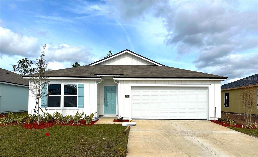 Photo of 31 Hulett Woods Road, Palm Coast, FL 32137 (MLS # FC296380)