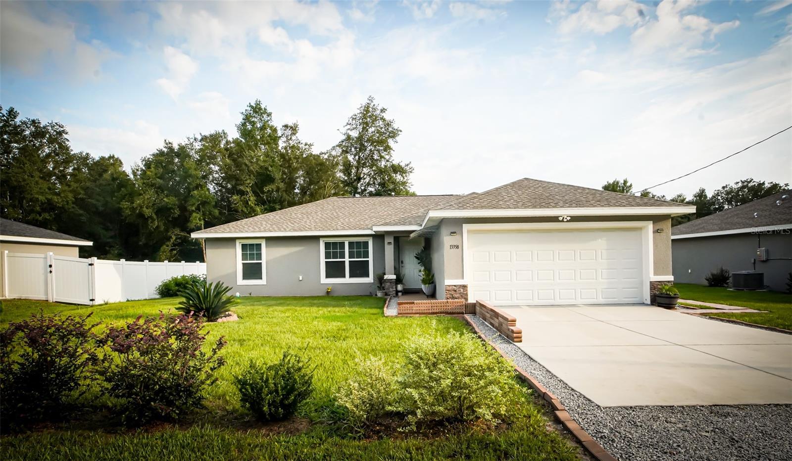 Welcome to this stunning 3-bedroom, 2-bath home featuring a spacious and thoughtfully designed open floorplan. The main living areas and bedrooms are finished with durable and stylish luxury vinyl plank (LVP) flooring, while the bathrooms showcase elegant tile for a clean and polished look.
The heart of the home is the gourmet kitchen, complete with wood shaker cabinets, sleek granite countertops, stainless steel appliances, and a large island perfect for meal prep or casual dining. Whether you're hosting guests or enjoying a quiet night in, the open layout seamlessly connects the kitchen to the living and dining areas, creating a warm and inviting atmosphere.
Additional highlights include a 2-car garage, a water softener system for added comfort, and modern finishes throughout. This move-in-ready home offers the perfect blend of function and style—ideal for families, entertainers, or anyone seeking a low-maintenance lifestyle in a beautifully appointed space.