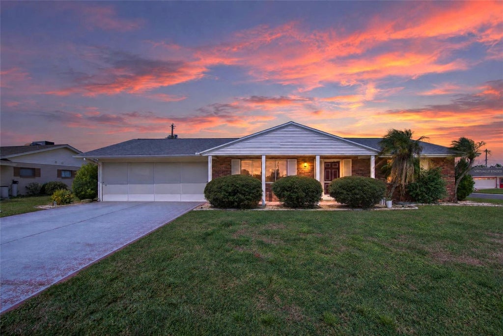 Photo of 801 Oakmont Avenue, Sun City Center, FL 33573 (MLS # TB8559876)