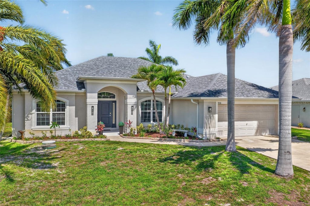 Photo of 9276 Miami Circle, Port Charlotte, FL 33981 (MLS # C7526946)