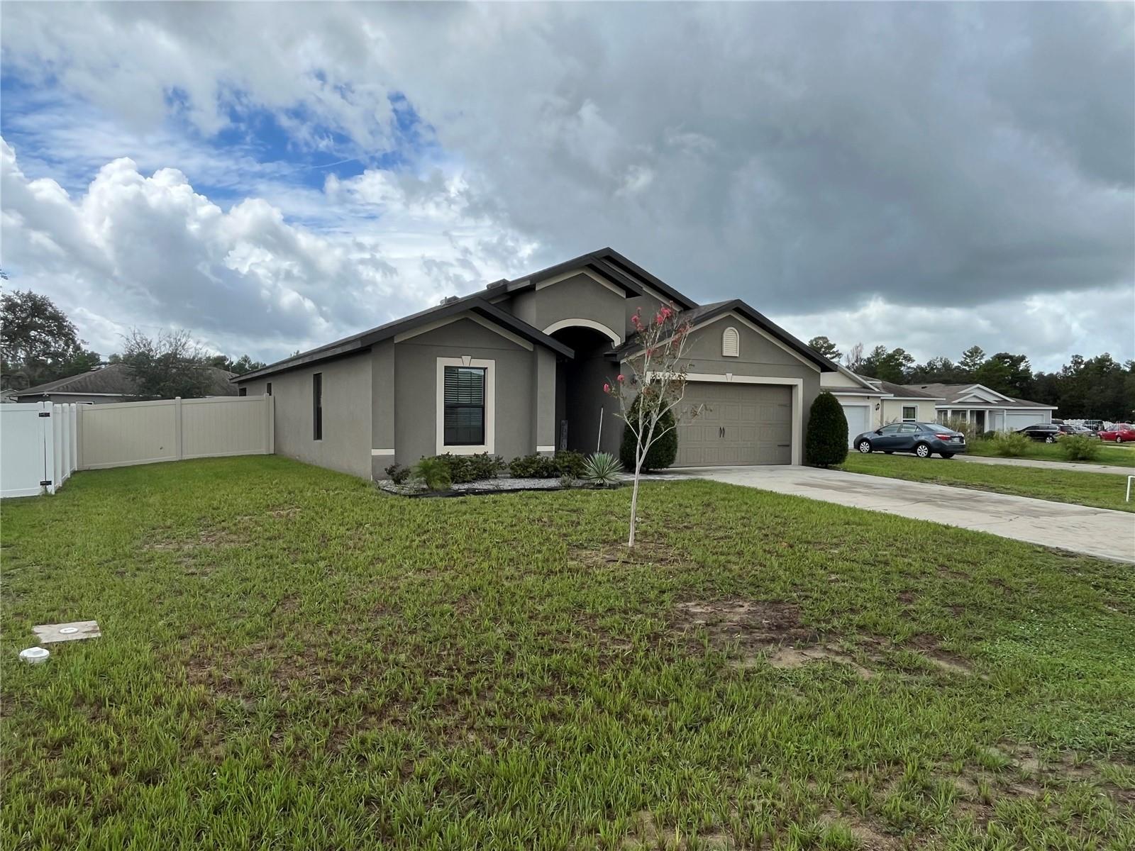 Discover your next home in the heart of Poinciana! This stunning 4-bedroom, 2-bath residence offers 1,851 sq ft of modern living space, thoughtfully designed with an open floor plan, high ceilings, and abundant natural light. The spacious kitchen features ample cabinetry, sleek countertops, and a large breakfast bar, seamlessly connecting to the dining and living areas—perfect for both daily living and entertaining. The primary suite provides a private retreat with a walk-in closet and ensuite bathroom, while three additional bedrooms with versatility for family, guests, or a home office. Enjoy the convenience of a two-car garage, a laundry area, and a backyard ready for relaxation or gatherings. As part of the community, tenants will have access to top-notch amenities, including a sparkling swimming pool, playgrounds, and recreational areas—bringing comfort and leisure right to your doorstep. Ideally located near schools, shopping, dining, and major highways, this home combines style, space, and convenience. Don’t miss the chance to live in this beautiful home—schedule your tour today and experience.