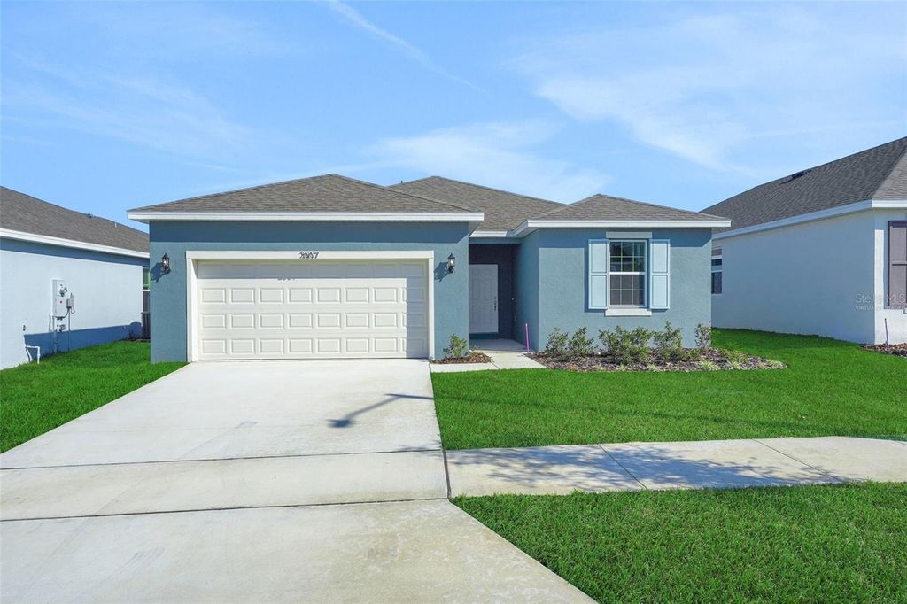 Photo of 2007 Firethorn Loop, Haines City, FL 33844 (MLS # G5110289)