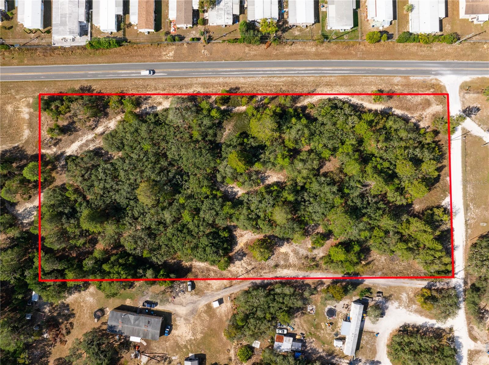 Discover the potential of this 4.2 acre property in beautiful Brooksville, Florida. This high and dry land--outside any flood zones--offers the potential to subdivide into one-acre lots. This makes it a versatile choice for residential developers or anyone looking to create their ideal estate. Seller is open to owner financing.
Convenience is key with this property, located just a couple blocks from Coastal Way Shopping Center, offering retail, dining, and daily essentials. Commuters will appreciate the quick access to Suncoast Parkway, providing a seamless route to Tampa.
Nature lovers will relish proximity to the scenic Suncoast Trail for biking, walking and enjoying Florida's natural beauty. Just 5 miles away, Weeki Wachee Springs State Park awaits, a paradise for outdoor enthusiasts with kayaking, paddleboarding, fishing and manatee sight-seeing in the crystal-clear springs.
Per Hernando County zoning, this property may be subdivided into four 1-acre lots, offering flexibility for development.