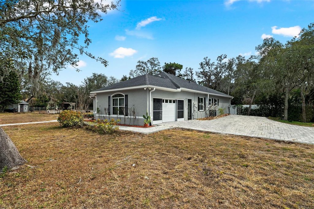 Photo of 6568 Millstone Drive, New Port Richey, FL 34655 (MLS # TB8475955)