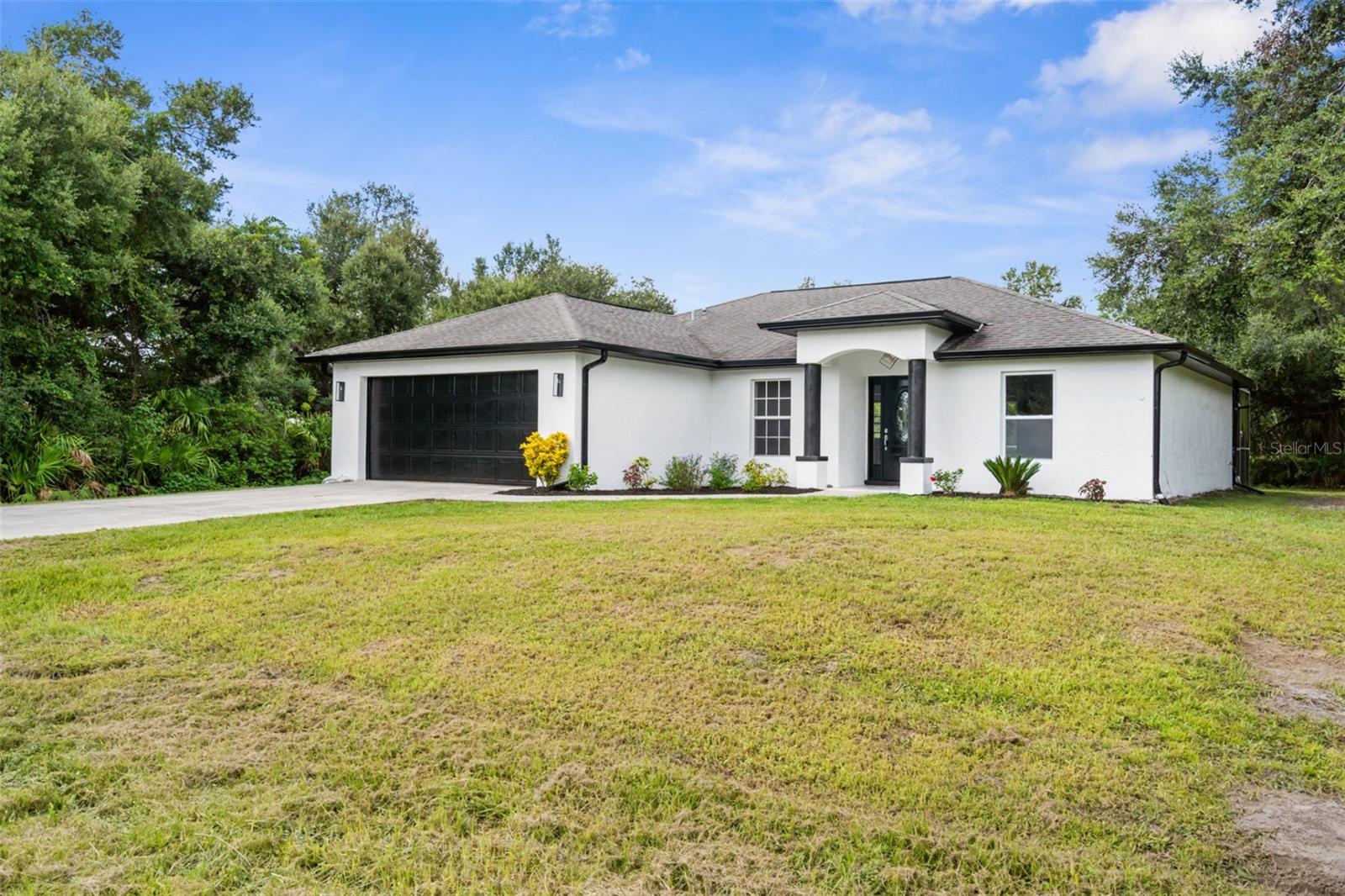 Welcome to your beautifully remodeled home in one of North Port’s most sought-after neighborhoods! This 3-bedroom, 2-bathroom residence offers modern updates, functional design, and peace of mind with no flood zone designation.Step inside to find a bright, open living space with fresh paint, new flooring, and stylish finishes throughout. The upgraded kitchen features contemporary cabinetry, granite countertops, and stainless-steel appliances, perfect for cooking and entertaining.The split floor plan provides privacy, with a spacious primary suite including a walk-in closet and an updated en-suite bathroom. The additional bedrooms are generously sized and share a fully remodeled second bath.Outside, the property boasts a well-maintained yard and a 2-car garage, offering ample parking and storage. Located close to schools, parks, shopping, and dining, this home combines comfort, convenience, and value.Key Features:Completely remodeled interior3 bedrooms / 2 bathrooms2-car garageNo flood zoneMove-in ready Great neighborhood Don’t miss this opportunity—schedule your private showing today!