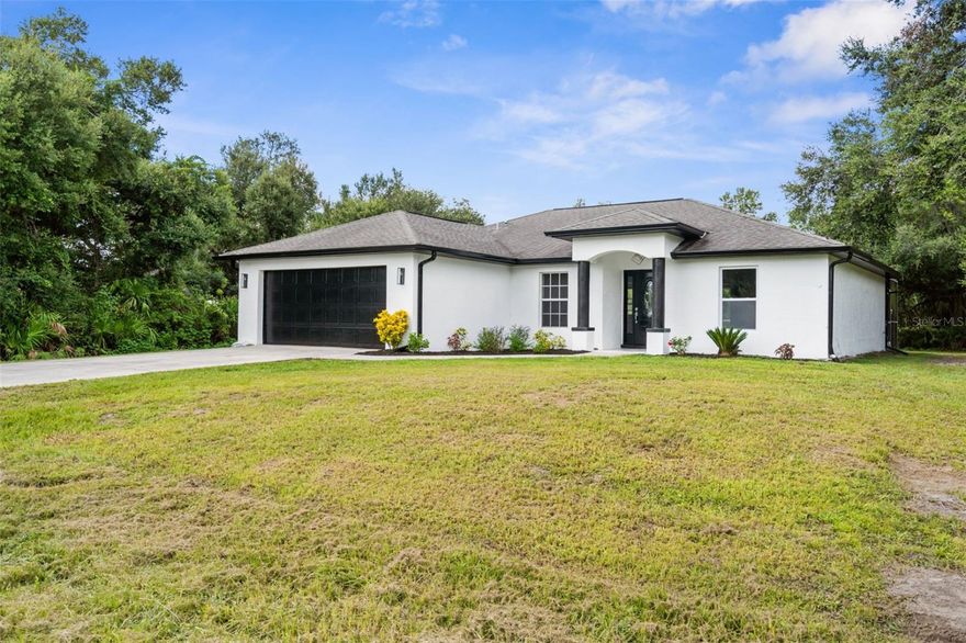 Welcome to your beautifully remodeled home in one of North Port’s most sought-after neighborhoods! This 3-bedroom, 2-bathroom residence offers modern updates, functional design, and peace of mind with no flood zone designation.Step inside to find a bright, open living space with fresh paint, new flooring, and stylish finishes throughout. The upgraded kitchen features contemporary cabinetry, granite countertops, and stainless-steel appliances, perfect for cooking and entertaining.The split floor plan provides privacy, with a spacious primary suite including a walk-in closet and an updated en-suite bathroom. The additional bedrooms are generously sized and share a fully remodeled second bath.Outside, the property boasts a well-maintained yard and a 2-car garage, offering ample parking and storage. Located close to schools, parks, shopping, and dining, this home combines comfort, convenience, and value.Key Features:Completely remodeled interior3 bedrooms / 2 bathrooms2-car garageNo flood zoneMove-in ready Great neighborhood Don’t miss this opportunity—schedule your private showing today!