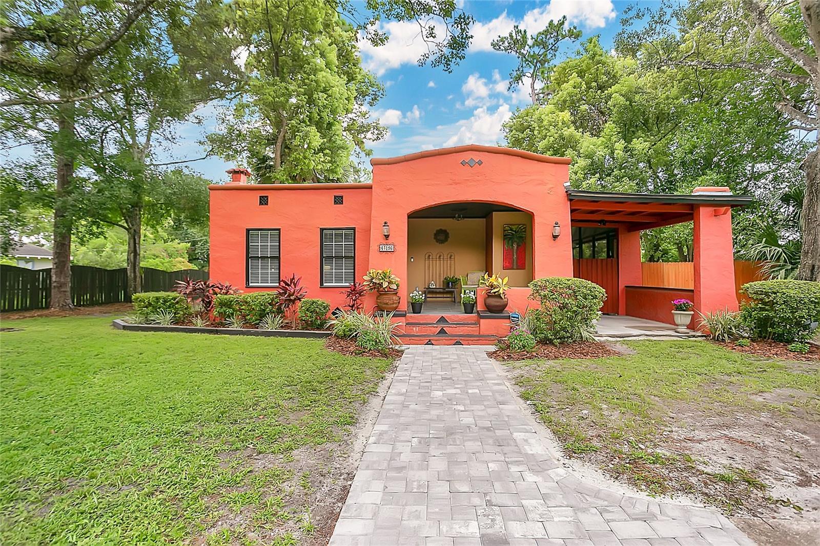 Don't Miss this Stunning Spanish Mediterranean Bungalow! Meticulously Maintained and Move-In Ready - This Sweet Home sits on an Oversized Lot (71x110) Just Outside of Sanford's Historic District and Offers a Perfect Blend of Character and Comfort. A Deep Welcoming Front Porch Sets the Tone for this Delightful Home. A Light-Filled Living Room with Decorative Fireplace Brings on the Cozy. Glass Bi-Fold Doors Lead to a Formal Dining Room with an Original Corner Built In - Ready to Display Your Collection of Treasures. The Dining Room Opens to the Updated and Gorgeous Kitchen which Boasts Stainless Appliances (Gas Range, Refrigerator, Dishwasher), Farmhouse Sink and Granite Countertops. Off the Kitchen is a Nicely Sized Laundry/Utility Room that Opens to the Updated Low-Maintenance TREX Deck and Fenced Backyard. The Home offers Two Bedrooms and an Updated Hall Bathroom. The Second Bedroom is off of Living Room with Glass French Doors. This Bedroom Opens Directly to a Screen Lanai - Imagine Catching Up with Your Morning News or Enjoying that Evening Cocktail in this Wonderful Peaceful Space. A Storage Shed in the Backyard for Yard Equipment. A Dining Area and a Firepit Enhance the Potential of the Backyard for Entertaining Friends and Family. Additional Highlights Include: Off Street Parking. New Paver Walkway. Newer Windows with New Blinds (Help with Energy Efficiency), New Roof (2023), AC(2021), Tankless Gas Water Heater. Minutes to Downtown Sanford Restaurants, Breweries, Galleries and Marina and located in the Golf Cart Zone. Schedule an Appointment Today to See this Incredible Home!