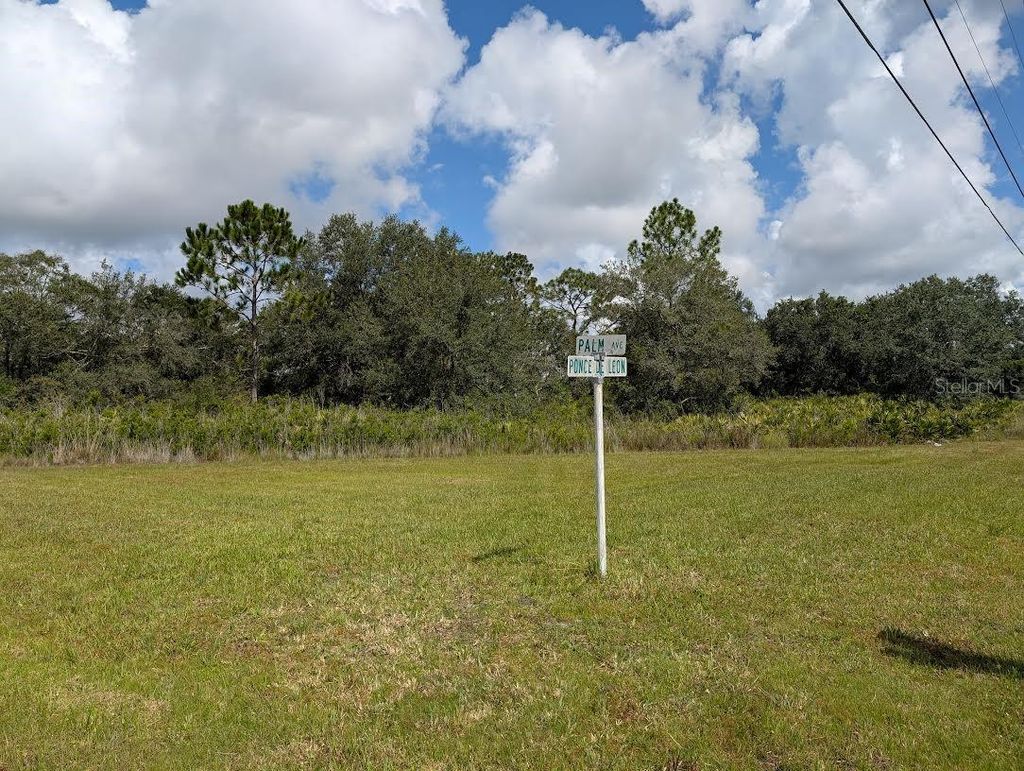 Photo of 407 Palm Avenue, Indian Lake Estates, FL 33855 (MLS # TB8415153)