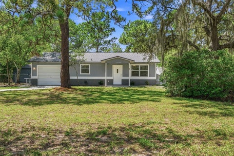 Photo of 10380 Golden Avenue, Weeki Wachee, FL 34613 (MLS # W7887813)