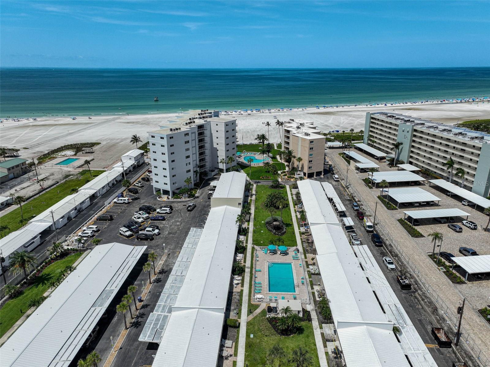 Never been rented wonderful gulf side attached villa in an all ground level association. This completely updated, open floor plan unit has had newly installed porcelain tile throughout, new hurricane impact sliders, new appliances, hot water heater, interior washer and dryer, all new plumbing, including under slab, as well as a new A/C installed in November of 2022. The HOA installed a new roof on the property in 2023, too! Jamaica Royale allows short term rentals so this could be a great investment property or keep it for your own second home. This is the closest gulf side weekly rental property to the main public beach offering 3 swimming pools, grilling stations and shuffle board. Make this great property yours today at a value!