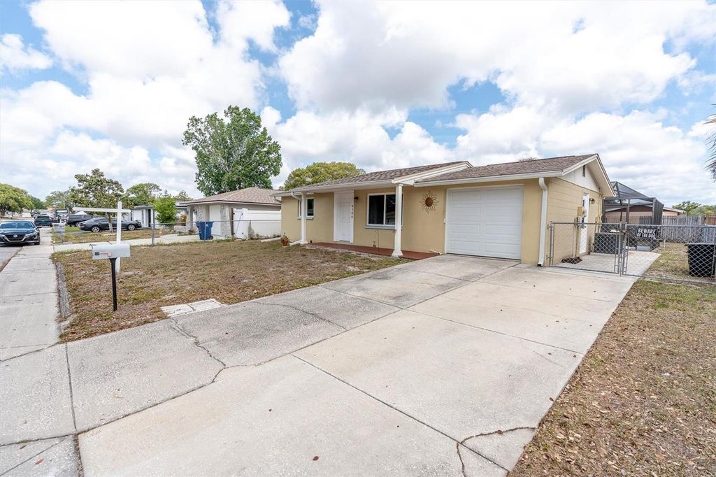 Photo of 9106 Lunar Lane, Port Richey, FL 34668 (MLS # W7885369)