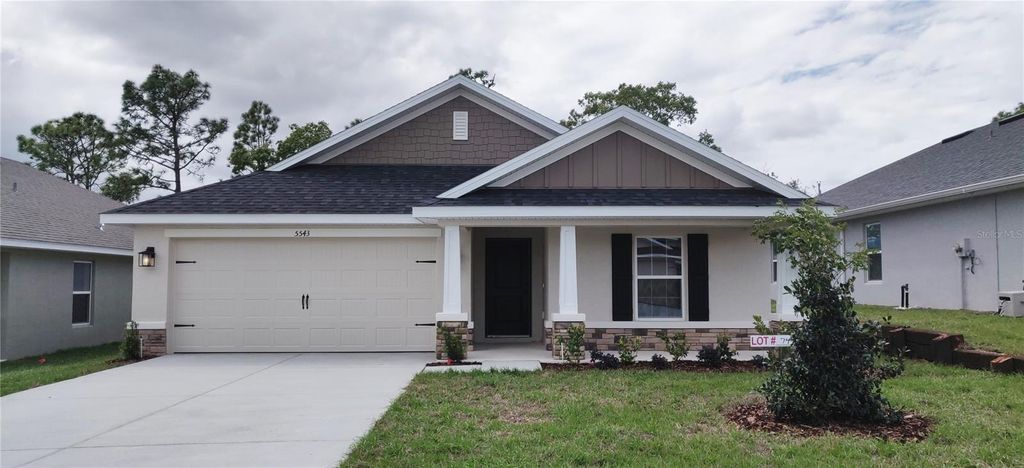 Photo of 5543 Ocean Breeze Drive, Spring Hill, FL 34609 (MLS # OM715557)