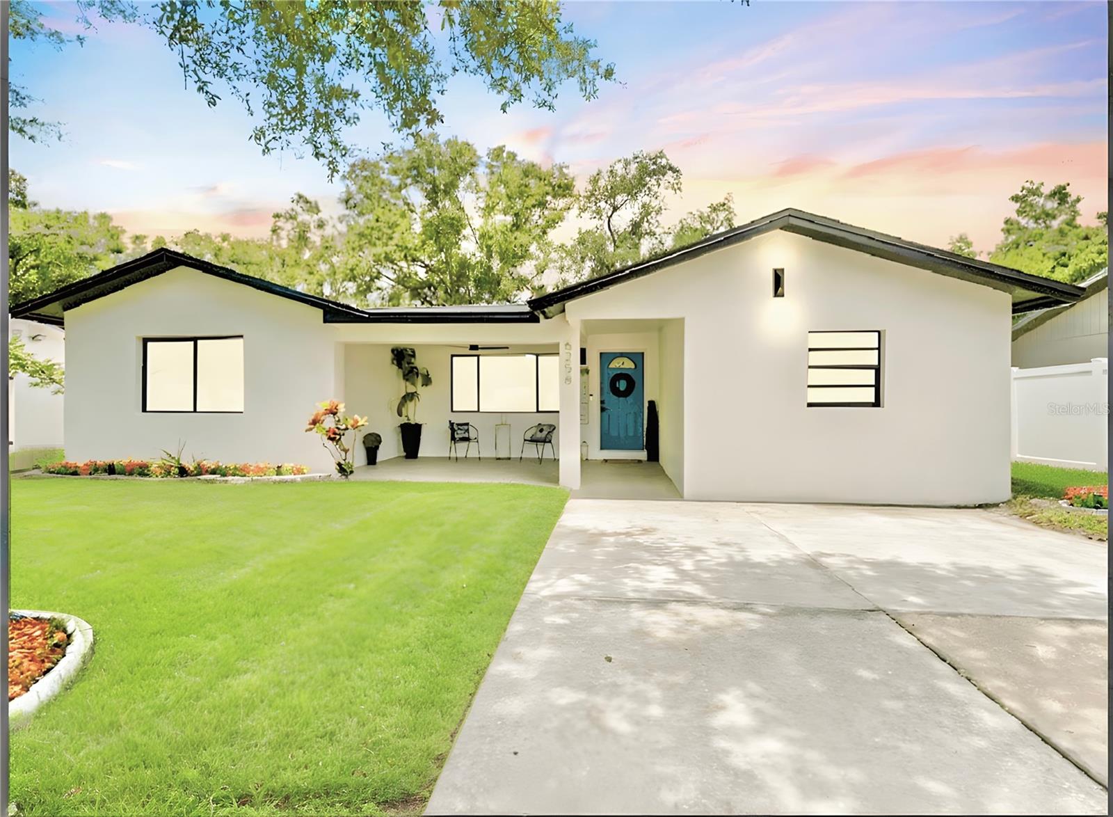 One or more photo(s) has been virtually staged. Welcome to this beautifully renovated home tucked away on a quiet dead-end street, offering both privacy and modern comfort. Completely updated inside and out, this 4-bedroom, 2.5-bath property features a brand-new roof (2025), stylishly remodeled bathrooms, an upgraded kitchen with new appliances, fresh interior and exterior paint, and updated flooring throughout. The extra-large living room provides an inviting space for gatherings, while the versatile 4th bedroom can easily serve as a home office, den, or flex space to suit your needs. Situated on an oversized lot with a huge fully fenced backyard, there’s plenty of room for pets, play, gardening, or entertaining. With no HOA, you’ll enjoy the freedom to truly make this home your own, and being in Flood Zone X offers peace of mind. All of this is just minutes from award-winning Gulf beaches, shopping, dining, and entertainment—combining the best of relaxed Florida living with everyday convenience.