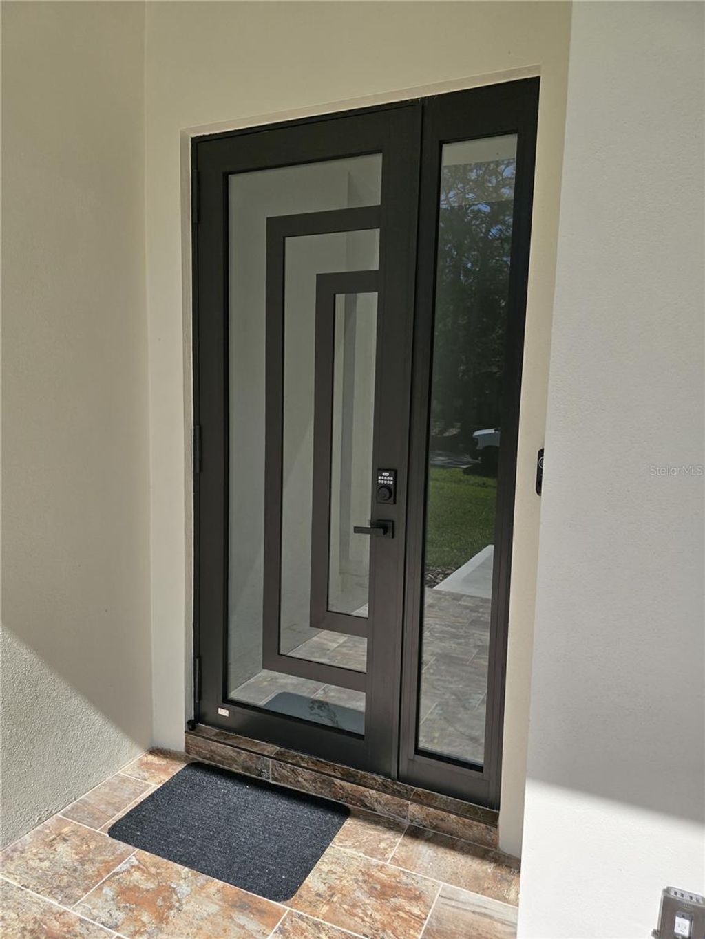 Photo of 5823 Whippoorwill Drive, Tampa, FL 33624 (MLS # TB8444830)