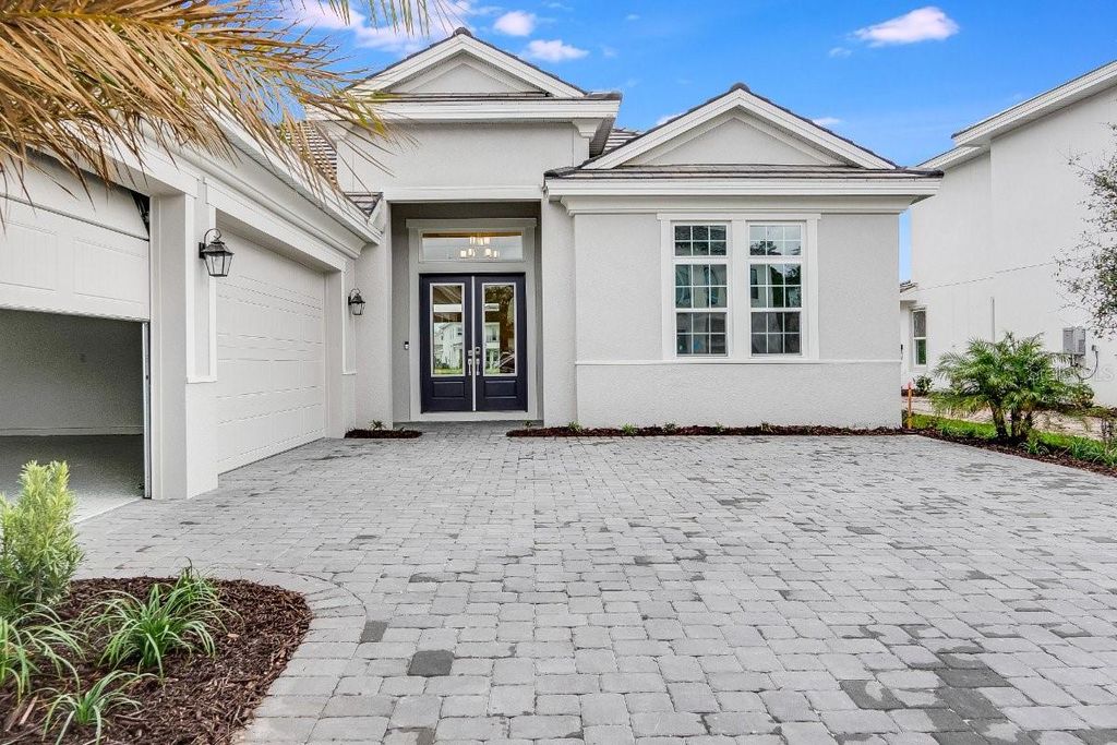 Photo of 33797 Ocean Spray Lane, Wesley Chapel, FL 33543 (MLS # T3528272)