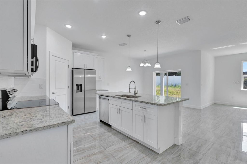 Photo of 113 W Redding Street, Davenport, FL 33837 (MLS # TB8488005)