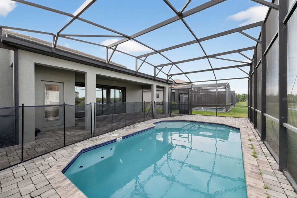 Photo of 193 Macaulay S Cove, Haines City, FL 33844 (MLS # O6392521)