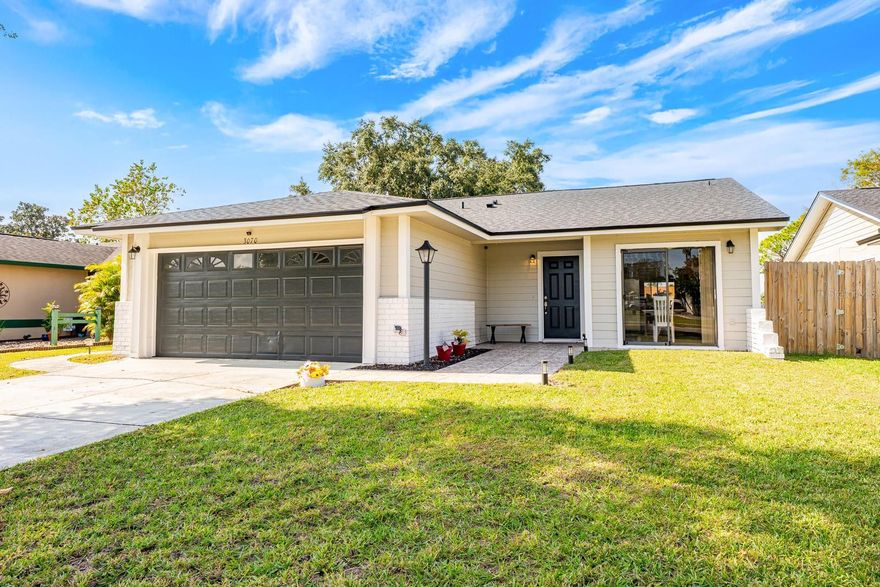 One or more photo(s) has been virtually staged. Ask about a lender provided RATE BUY-DOWN CREDIT on this home! **BRAND NEW PLUMBING/WATER HEATER (NOV 2025) **NEW ROOF (DEC 2024) **FRESH EXTERIOR PAINT **WATER VIEWS and more - welcome home! Move in ready and updated with care, this single-story 3-bedroom, 2-bath home in East Orlando’s established Curry Ford Woods community brings peace of mind from day one paired with a great central location. Major improvements include brand NEW PLUMBING & NEW WATER HEATER (November 2025), a NEW ROOF installed (December 2024) with a 10-year warranty transferable to the next owner, NEW CARPET in all bedrooms (2025), fresh EXTERIOR PAINT (2023), and a NEW STOVE – all backed by a transferable HOME WARRANTY. Easy care TILE FLOORS run throughout the main living areas, a VAULTED CEILING enhances the spacious feel, and sliding doors at the front and back of the home let natural light flow through. 
The kitchen is roomy and functional with STAINLESS STEEL APPLIANCES, generous storage, and a casual dining space that opens to a cozy patio – perfect for weekend grilling or sipping morning coffee. OPEN LIVING & DINING areas flow together comfortably, creating a central gathering space overlooking the backyard and pond beyond. The generous PRIMARY SUITE is your tranquil retreat complete with a WALK-IN CLOSET, an en-suite bath, and its own sliding door out to a private patio. Bedrooms two and three share a second full/guest bath off the hall. Outdoor living shines here with a large SCREENED LANAI, FENCED YARD, and peaceful WATER VIEWS that create a quiet place to unwind, and bonus - the HOT TUB stays! With no immediate rear neighbors, a pond lot, and a shed for added storage, the backyard feels like its own retreat. The super LOW HOA is another added bonus! Curry Ford Woods is a well established East Orlando community known for convenience, including a walking gate that leads directly to the elementary school. You are just minutes from Downtown Orlando, Waterford Lakes, Lee Vista, Lake Nona, area parks, shopping, dining, and the Orlando International Airport, with easy access to SR 417, 408, 528 and other major roadways. Well maintained, thoughtfully updated, and ready for immediate enjoyment – this home delivers the comfort, privacy, and a location you will love. Schedule your tour today and let us say WELCOME HOME!