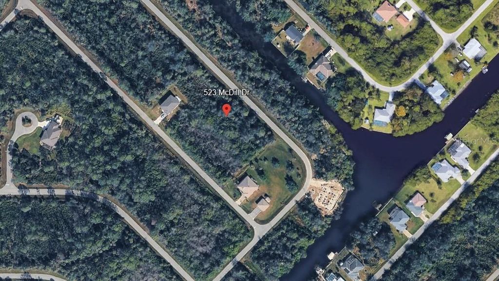 Photo of 523 Mcdill Drive, Port Charlotte, FL 33953 (MLS # C7521153)