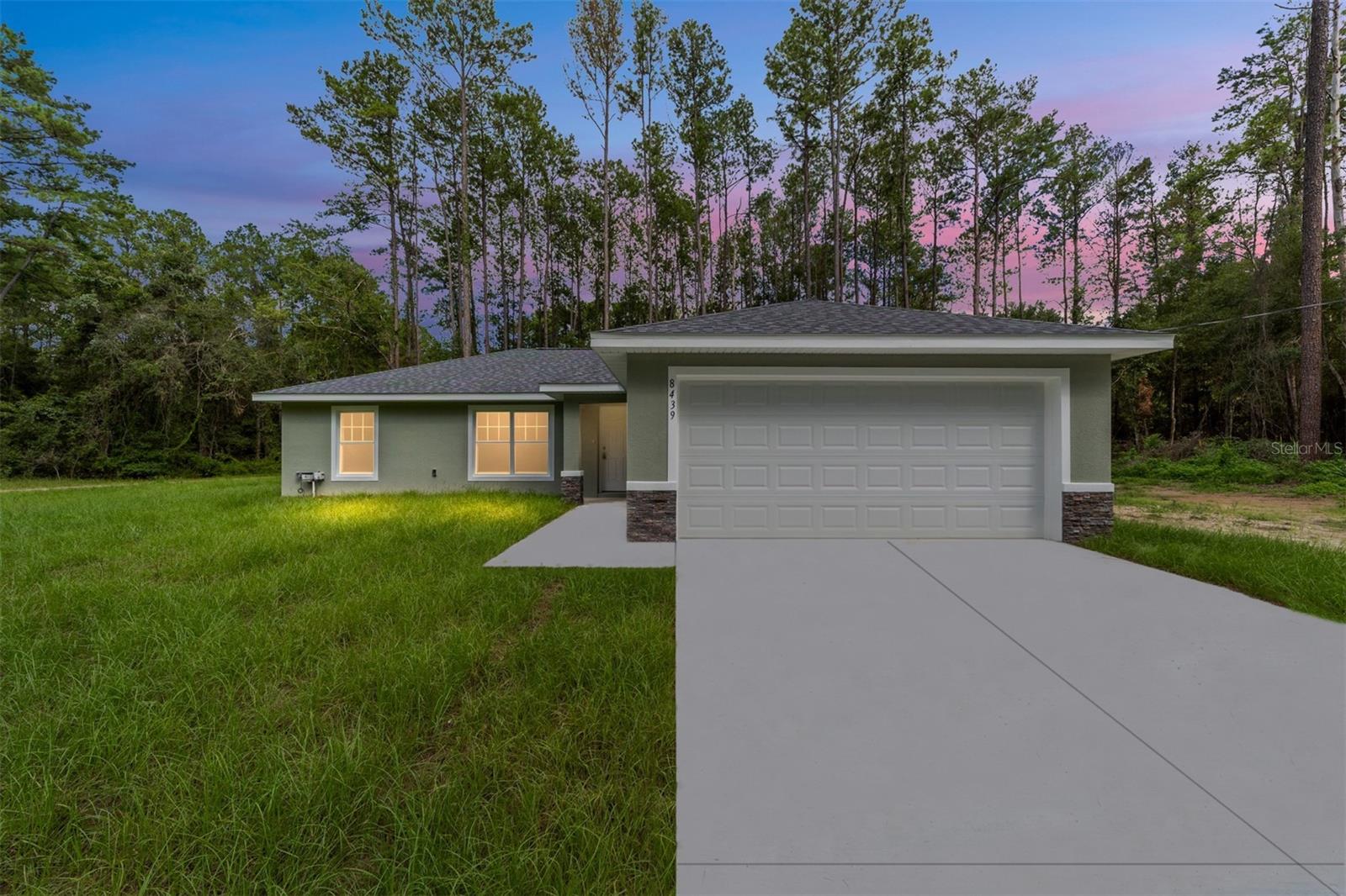 Home is complete! This gorgeous brand-new home located in SE Ocala is the ideal escape from the hustle and bustle of city life! With an open floor plan, pleasing neutral colors and vinyl plank flooring throughout, this 3-bedroom, 2-bathroom residence has all the charm and comfort any family could desire. Showcasing shaker style cabinets with granite counter tops in the kitchen, a washer/dryer hook up in the inside laundry for added convenience, plus a stainless-steel appliance package, this home is sure to impress. Enjoy your time in the neighborhood while nearby shopping, dining, medical centers and natural springs keep life exciting. Plus, its location near pristine rivers and springs allows for outdoor activities where adventure finds you!